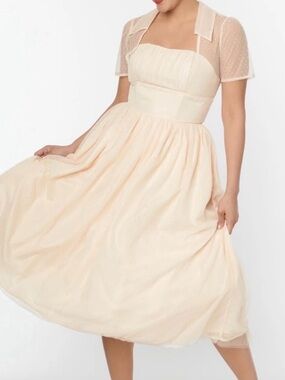 NWT - Unique vintage swing dress 
Women’s Cream Midi Dress with Sheer Bolero